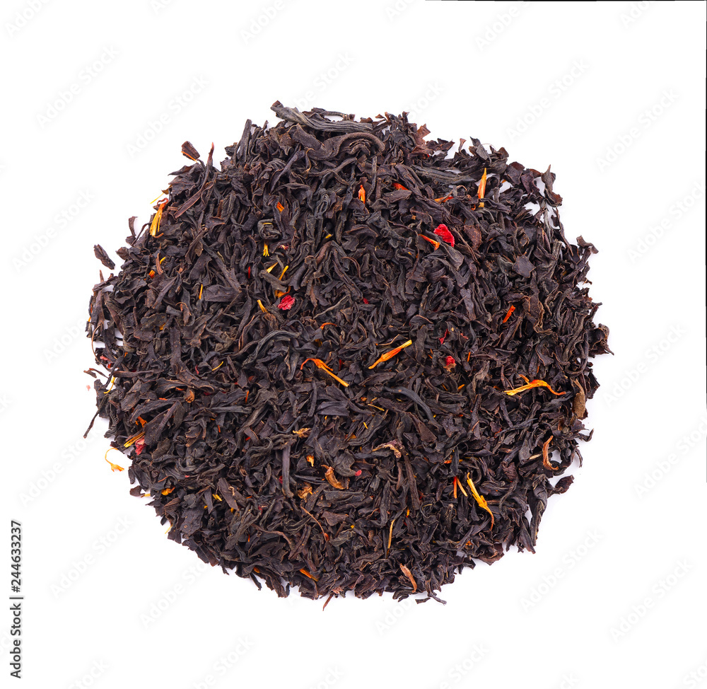 Black Ceylon tea with flower petals and bergamot, isolated on white background. Top view. Black Ceylon tea with flower petals and bergamot, isolated on white background. Top view.