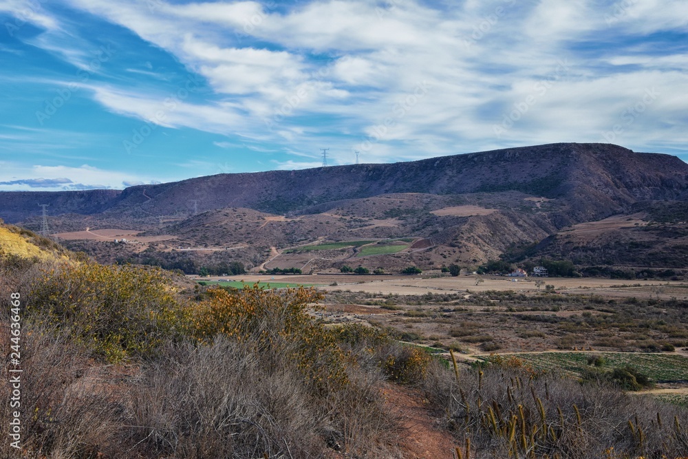 Obraz premium La Mision Valley landscapes and Beach in Mexico on the West Coast a small canyon near the Pacific Ocean that houses the Door of Faith and Buena Vida Orphanage, South of Tijuana, Mexico. 
