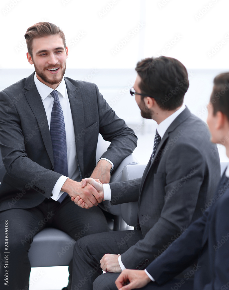 handshake business people in the office. handshake business people in the office.