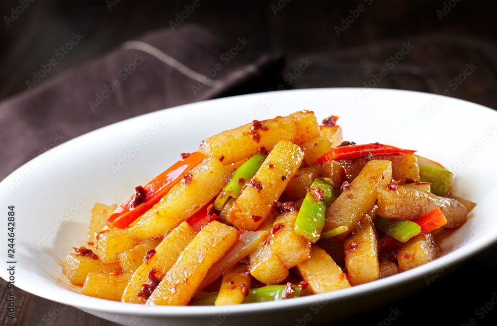 Delicious Chinese cuisine, spicy fried potatoes Delicious Chinese cuisine, spicy fried potatoes