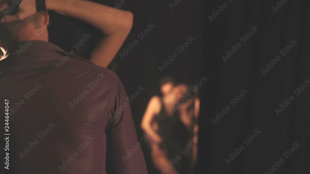 Sensual couple dance at home and watch their reflection in the mirror Sensual couple dance at home and watch their reflection in the mirror