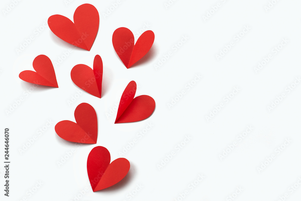 Red paper hearts on white background concept of Valentine's day