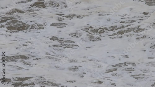 The Pacific Ocean. Swirling waves are on Pacific ocean after rain, Goat Rock Beach, Sonoma County, California winter. 