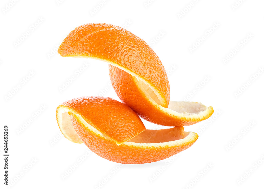 Cut slices of orange peel on a white background Cut slices of orange peel on a white background