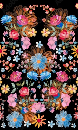 Embroidery seamless pattern with beautiful colorful flowers. Unusual floral design. Fashion print.