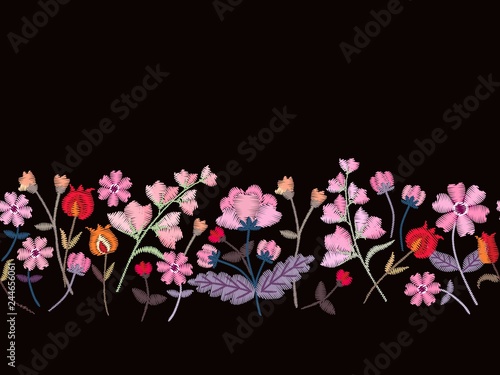 Floral embroidery. Seamless border with beautiful pink flowers on black background. Fashion design. Vector illustration.