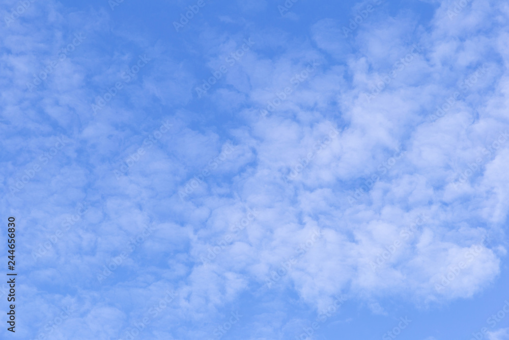 Blue sky background with white clouds, rain clouds on sunny summer or spring day. Blue sky background with white clouds, rain clouds on sunny summer or spring day.