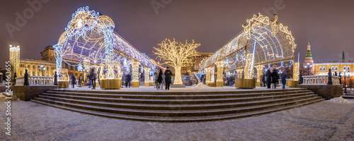 Canvas Print Festive New Year Illumination on the Manezhnaya square near Red square and Kremlin, Moscow, Russia