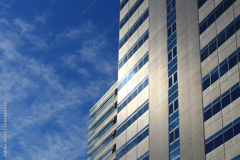 The outer wall of the building where the sunlight reflects The outer wall of the building where the sunlight reflects