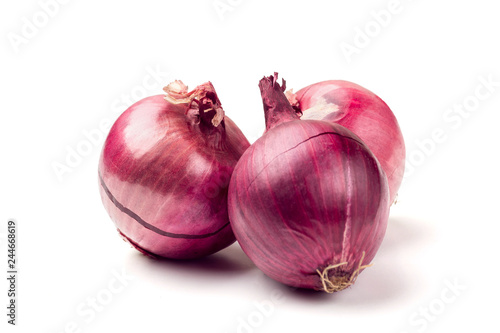 Three red onion bulb isolated on white background cutout