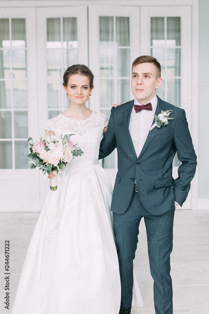 Beautiful couple in the Studio standing and dancing. Wedding in the European style fine art. Beautiful couple in the Studio standing and dancing. Wedding in the European style fine art.