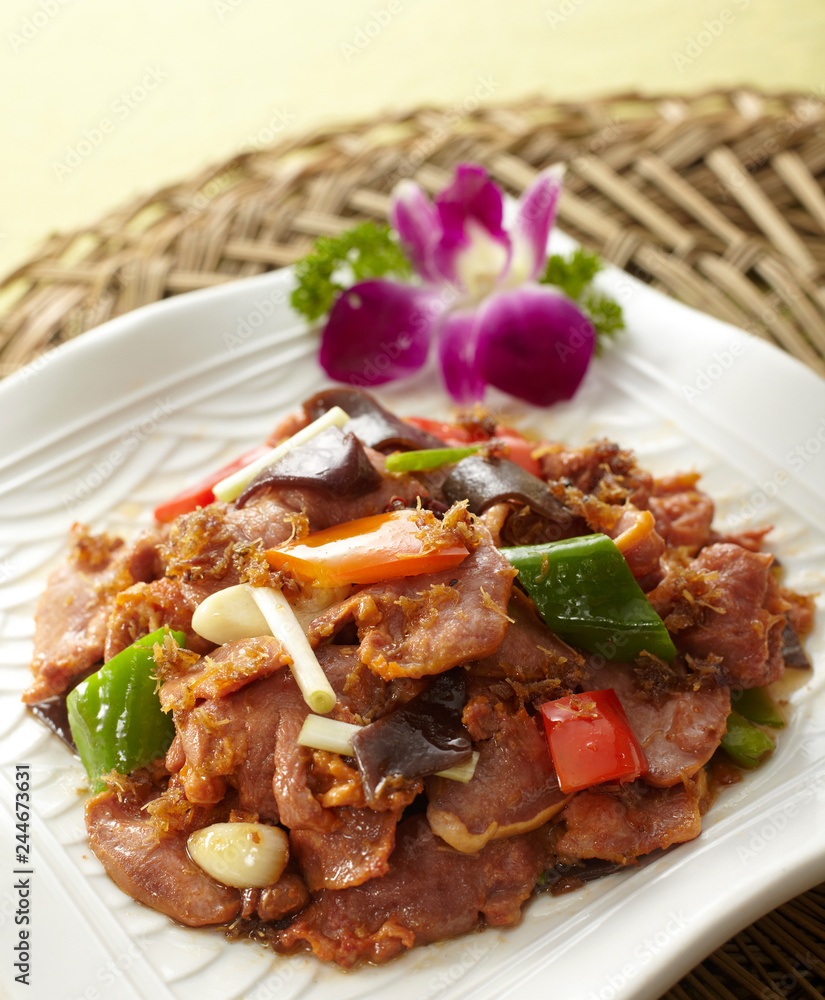 Delicious Chinese food, fried pork with sauce Delicious Chinese food, fried pork with sauce