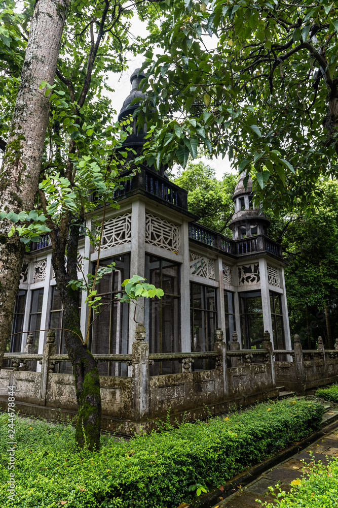 July 2017 – Kaiping, China - Birds nest in Li garden Kaiping Diaolou complex, near Guangzhou. Built by rich overseas Chinese, these family houses are a unique mix of Chinese and western architecture July 2017 – Kaiping, China - Birds nest in Li garden Kaiping Diaolou complex, near Guangzhou. Built by rich overseas Chinese, these family houses are a unique mix of Chinese and western architecture