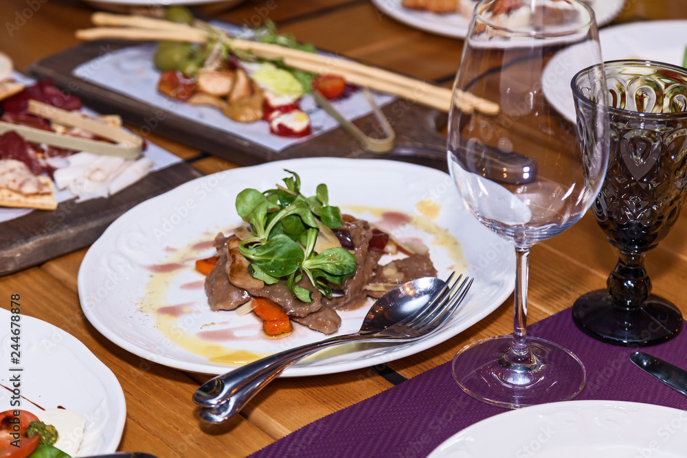 Different dishes on the holiday table Different dishes on the holiday table