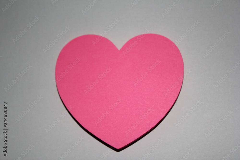 Valentines day card with sticky note in the shape of a heart Valentines day card with sticky note in the shape of a heart