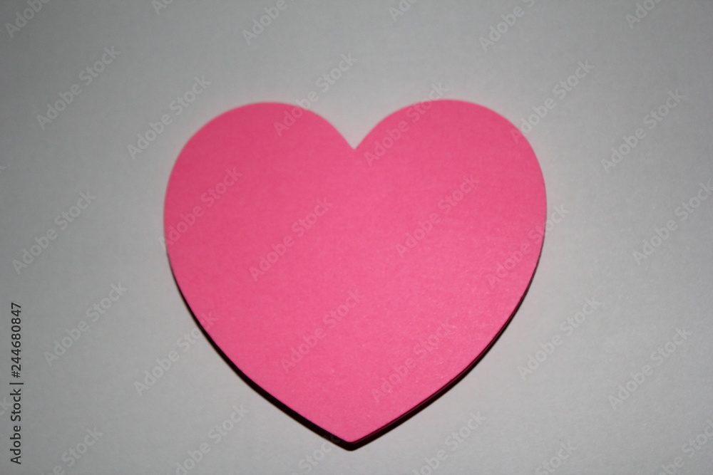 Valentines day card with sticky note in the shape of a heart