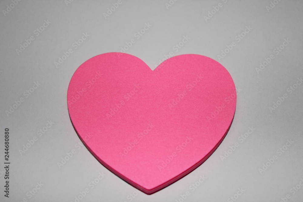 Valentines day card with sticky note in the shape of a heart Valentines day card with sticky note in the shape of a heart