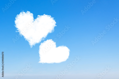 Canvas Print Loving couple of clouds are flying in the blue sky