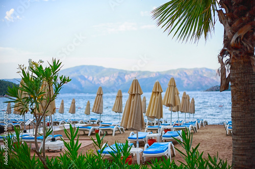 Fototapeta Naklejka Na Ścianę i Meble -  beach with sun umbrellas in Icmeler Turkey