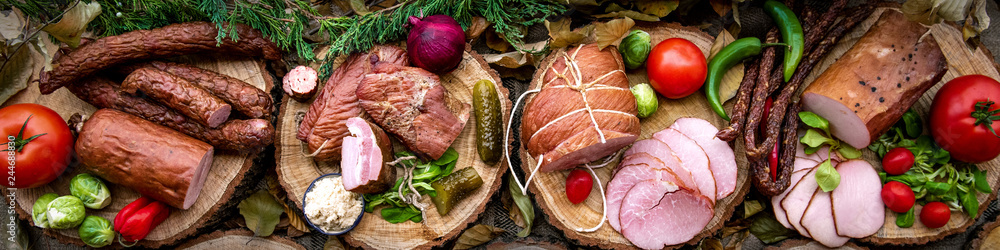 Assortment of cold meats: sausages, ham, bacon - obrazy, fototapety, plakaty 
