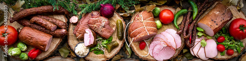 Assortment of cold meats: sausages, ham, bacon