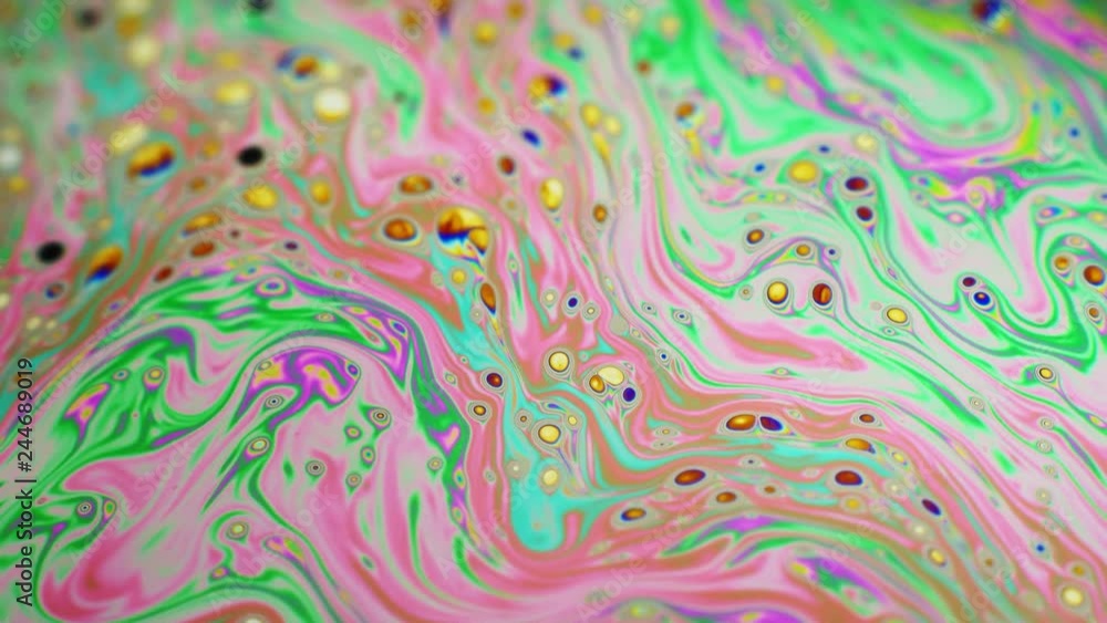 Psychedelic background of motion surface of colorful soap bubble Psychedelic background of motion surface of colorful soap bubble
