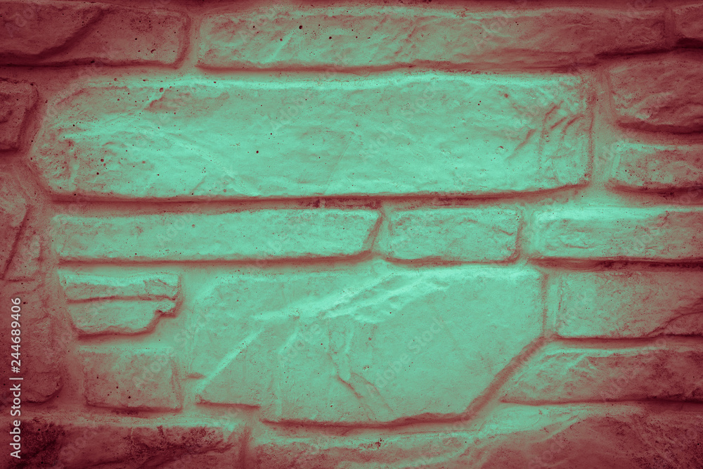 Abstract background. Wall made of brick, covered with paint.