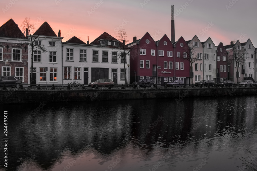 Sunset over the canal houses in Bergen op Zoom, the Netherlands