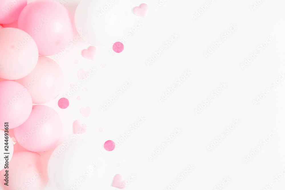 Balloons on white background. Frame made of white and pink balloons. Birthday, valentines day, holiday concept. Flat lay, top view, copy space