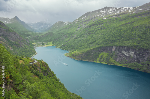 Fototapeta Naklejka Na Ścianę i Meble -  The Geirangerfjord with Geiranger seen from the Ornevegen