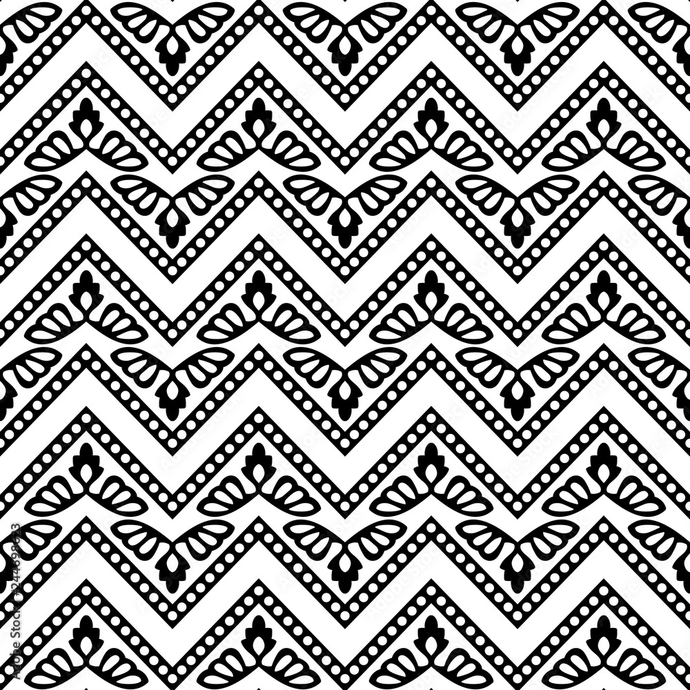 Woodblock printed seamless ethnic floral geometric pattern. Traditional oriental ornament of India Kashmir flowers with chevron motif, black on white background. Textile design.