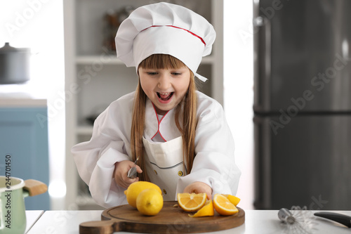 Cute little girl dressed as...