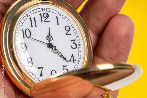 Pocket watch with close up view.