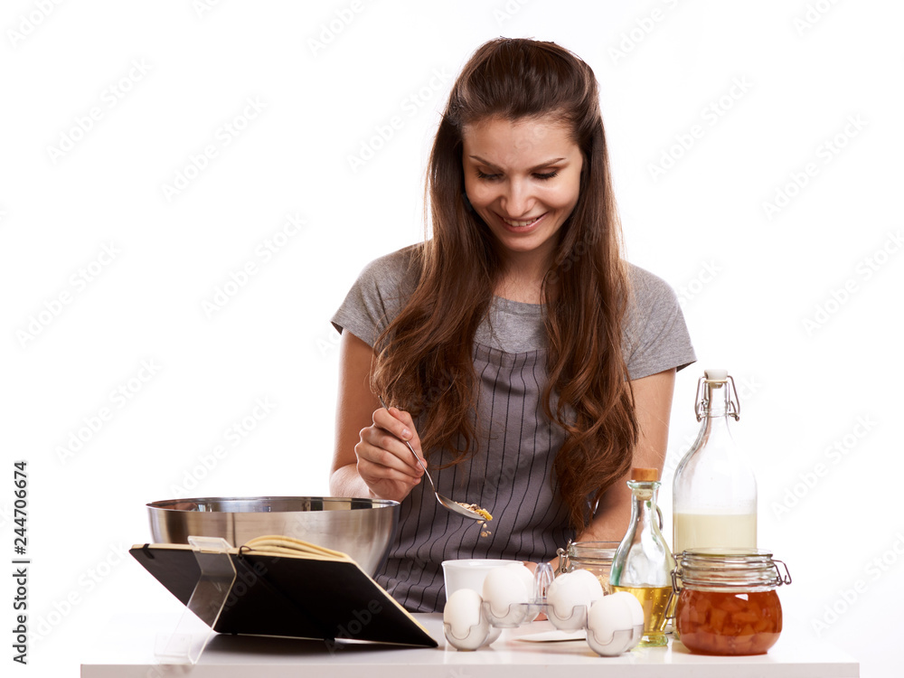 Portrait of beautiful chef home cook at home with dessert cupcakes homemade sweets Portrait of beautiful chef home cook at home with dessert cupcakes homemade sweets