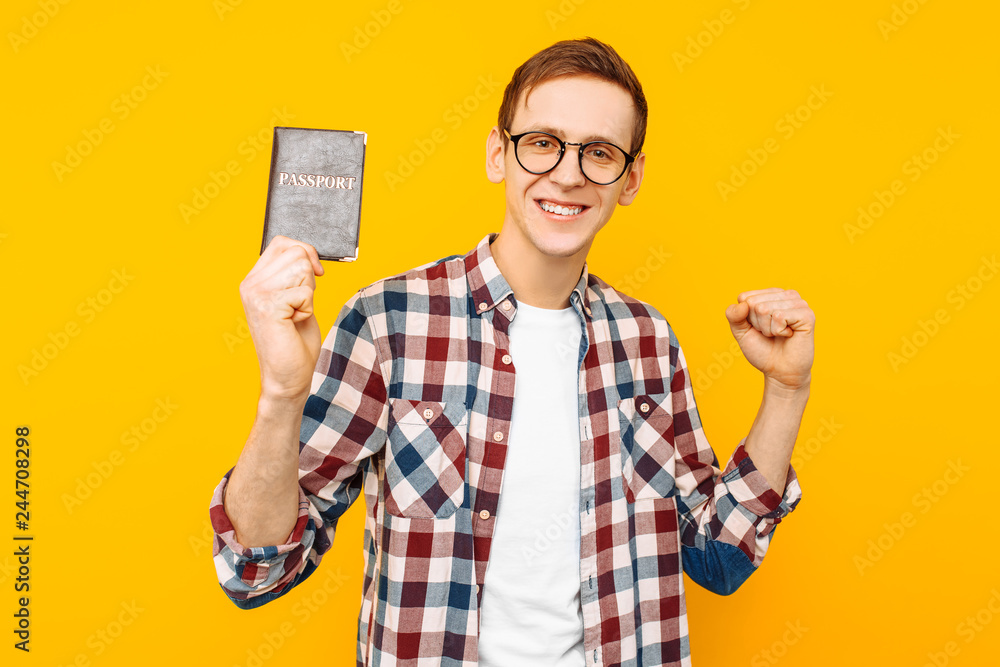 man with a passport in his hands, the guy got a passport man with a passport in his hands, the guy got a passport