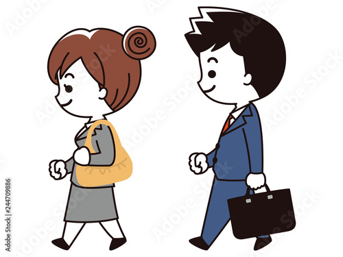 出勤するスーツの若い男女