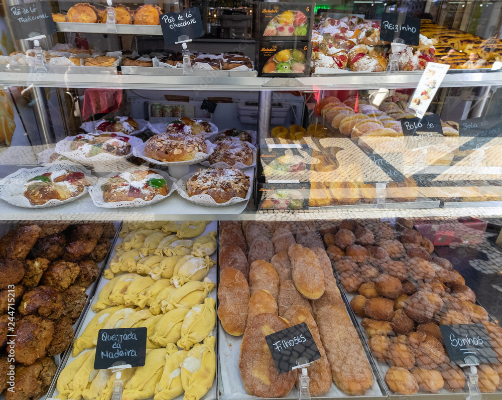 Variety of sweets in the small shops of Lisbon, Portugal