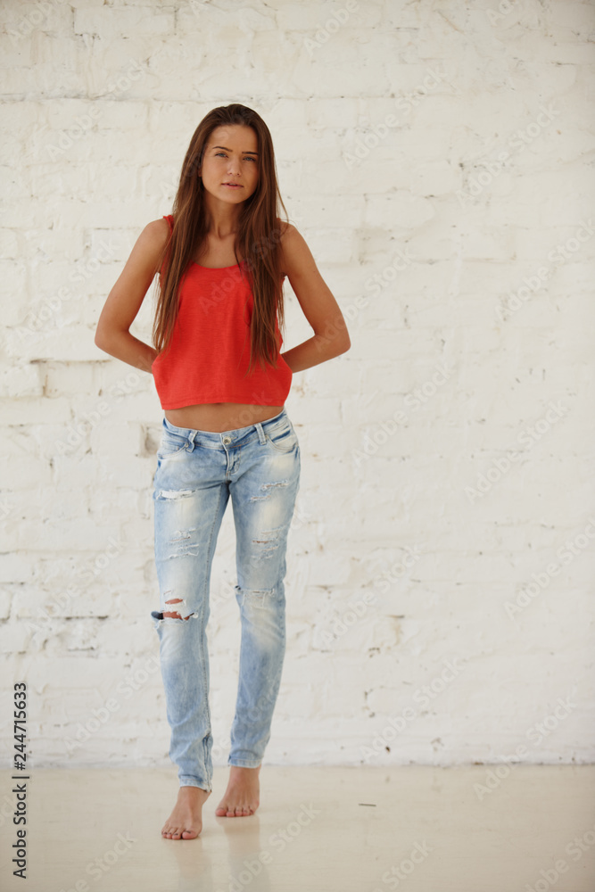 Cute girl posing in the loft studio Cute girl posing in the loft studio