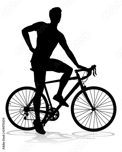 A bicycle riding bike cyclist in silhouette