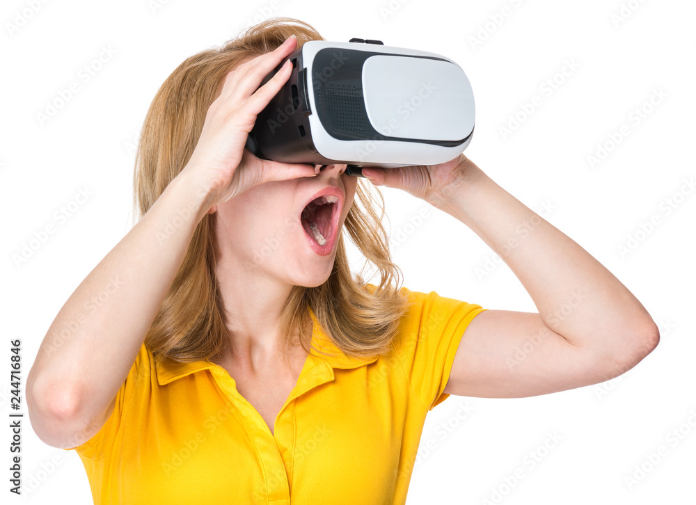 Wondering Young Woman in Virtual Reality Glasses, isolated on white background. Shocked Girl wearing VR device. Close-up portrait of Female with VR headset. Wondering Young Woman in Virtual Reality Glasses, isolated on white background. Shocked Girl wearing VR device. Close-up portrait of Female with VR headset.