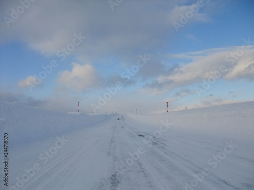 Snow-covered road © hoshi