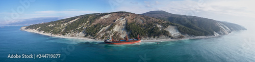 Fotografija GELENDZHIK, RUSSIA - JAN 19, 2018: The ship called Rio ran aground after a storm in the black sea