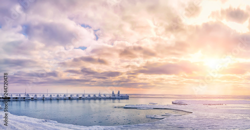 Winter landscape. Icy pier and  the frozen sea in the early morning.   © Ann Stryzhekin