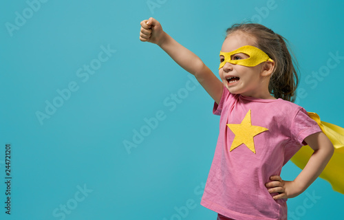 child playing superhero
