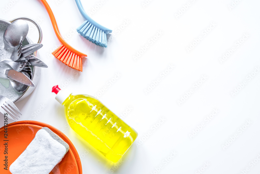 concept of washing dishes on white background top view concept of washing dishes on white background top view