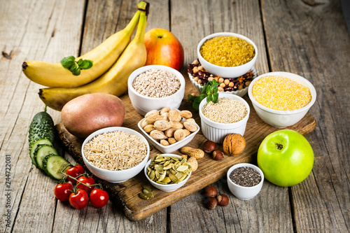 Selection of good carbohydrates sources - vegetables, fruits, grains, legumes, nuts and seeds. Healthy vegan diet photo