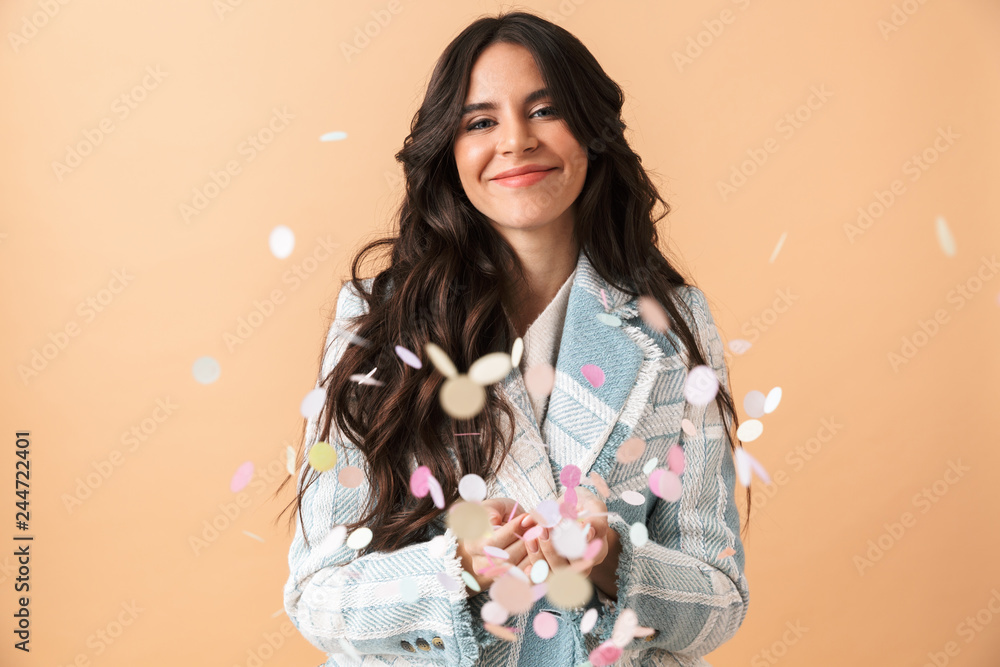 Beautiful brunette woman dressed in plaid jacket Beautiful brunette woman dressed in plaid jacket