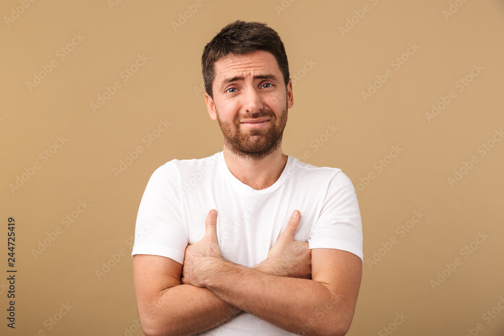 Portrait of a confused young man casually dressed Portrait of a confused young man casually dressed