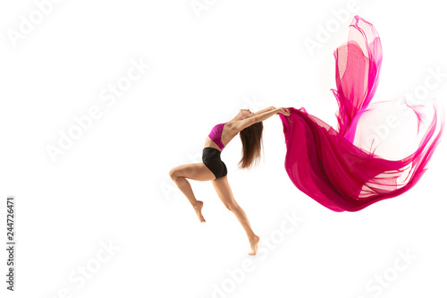 Graceful ballet dancer or classic ballerina dancing isolated on white studio. Woman dancing with pink silk cloth. The dance, performer, flexibility, elegance, performance, grace, artist, contemporary