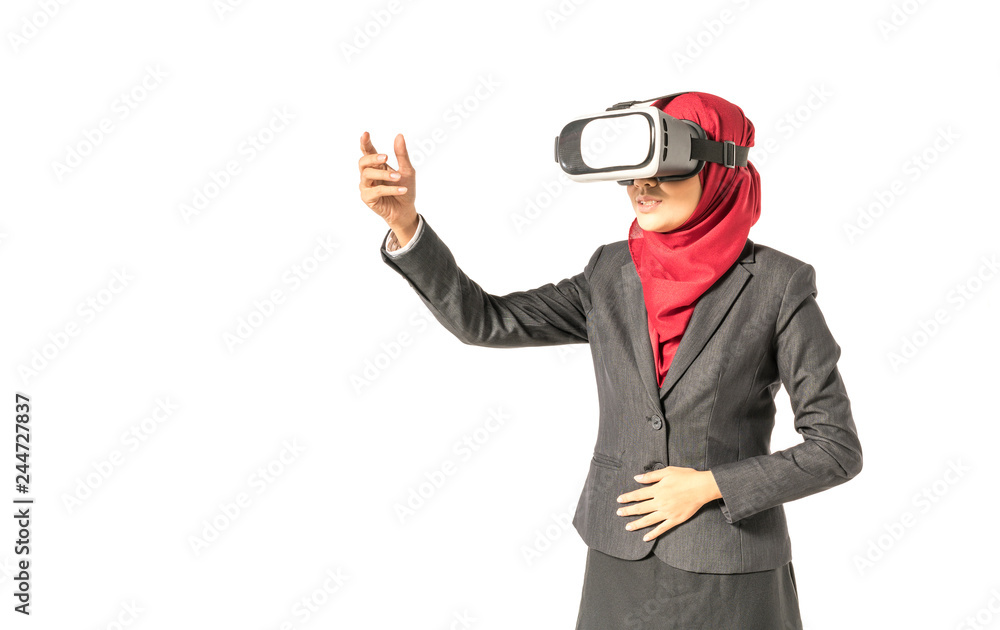 Veiled businesswoman wearing vr (Virtual Reality) box with white background. Technology conceptual. Veiled businesswoman wearing vr (Virtual Reality) box with white background. Technology conceptual.